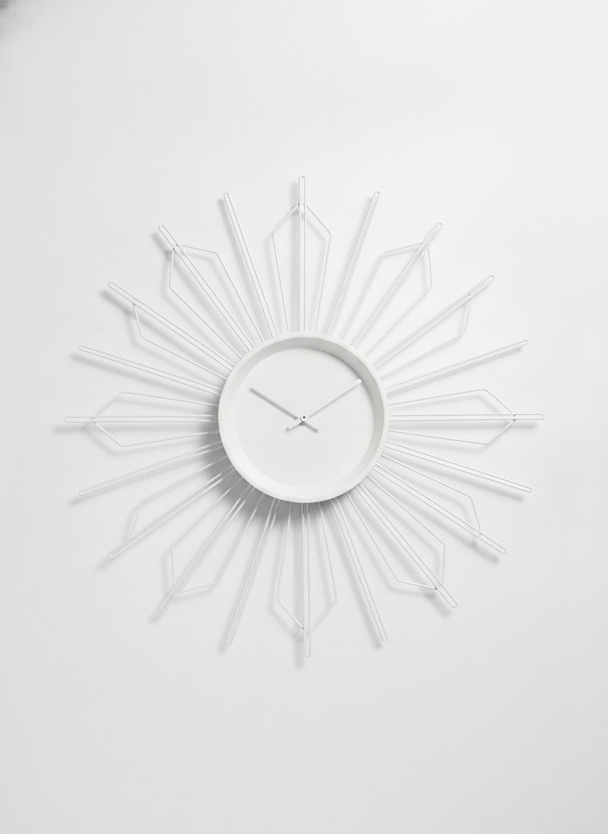 White Sunburst Geometric Accent Clock